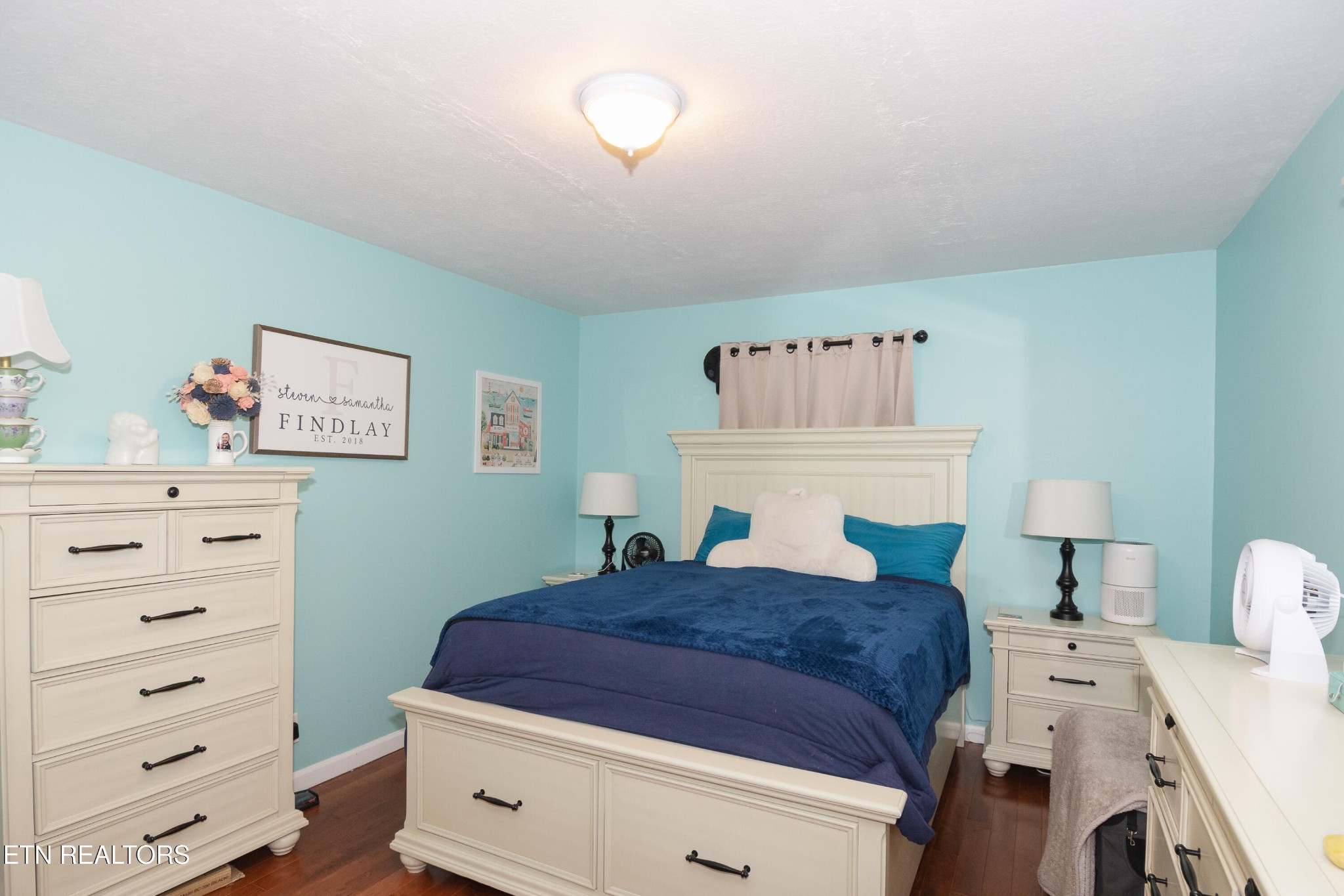 109 Ivy Lane Clinton, TN 37716 - Photo 21 of 36 a spacious bedroom with a bed and a cabinets