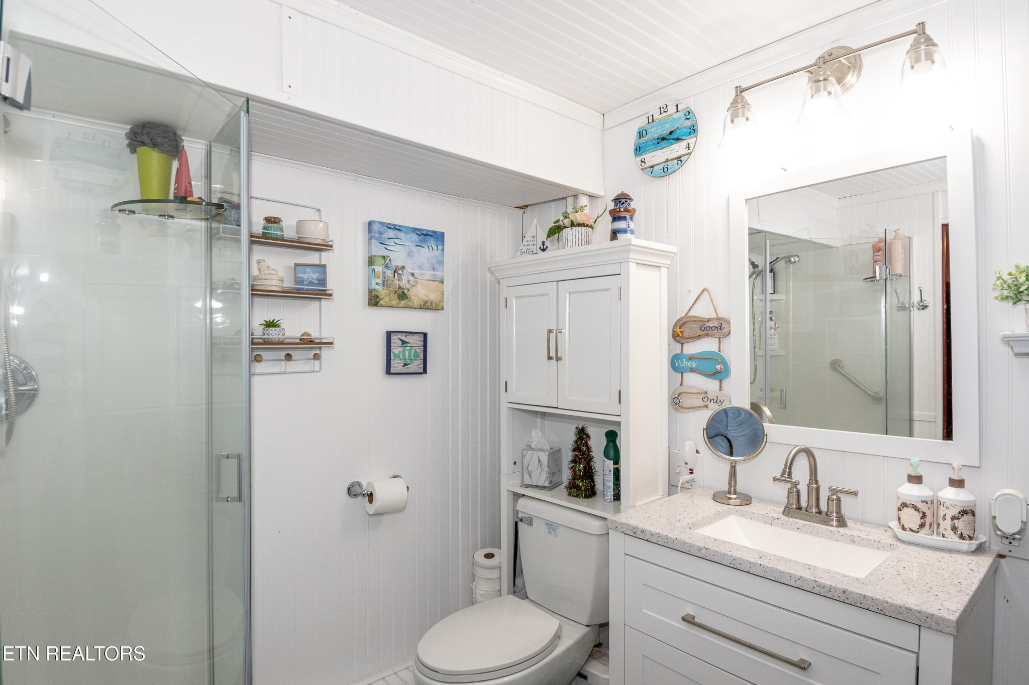 109 Ivy Lane Clinton, TN 37716 - Photo 26 of 36 a bathroom with a granite countertop sink toilet and shower