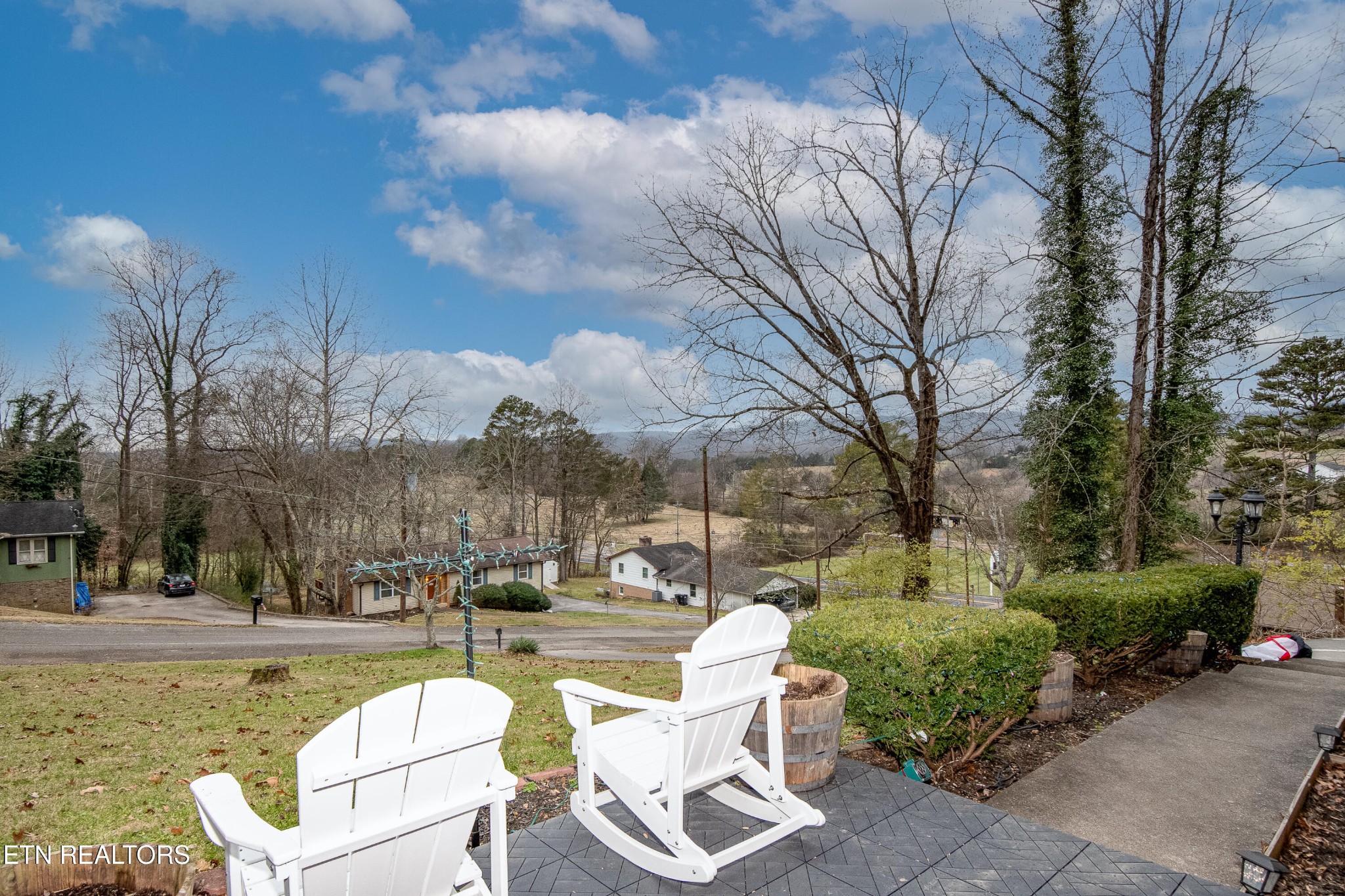 109 Ivy Lane Clinton, TN 37716 - Photo 29 of 36 a view of a patio with couches and a fire pit