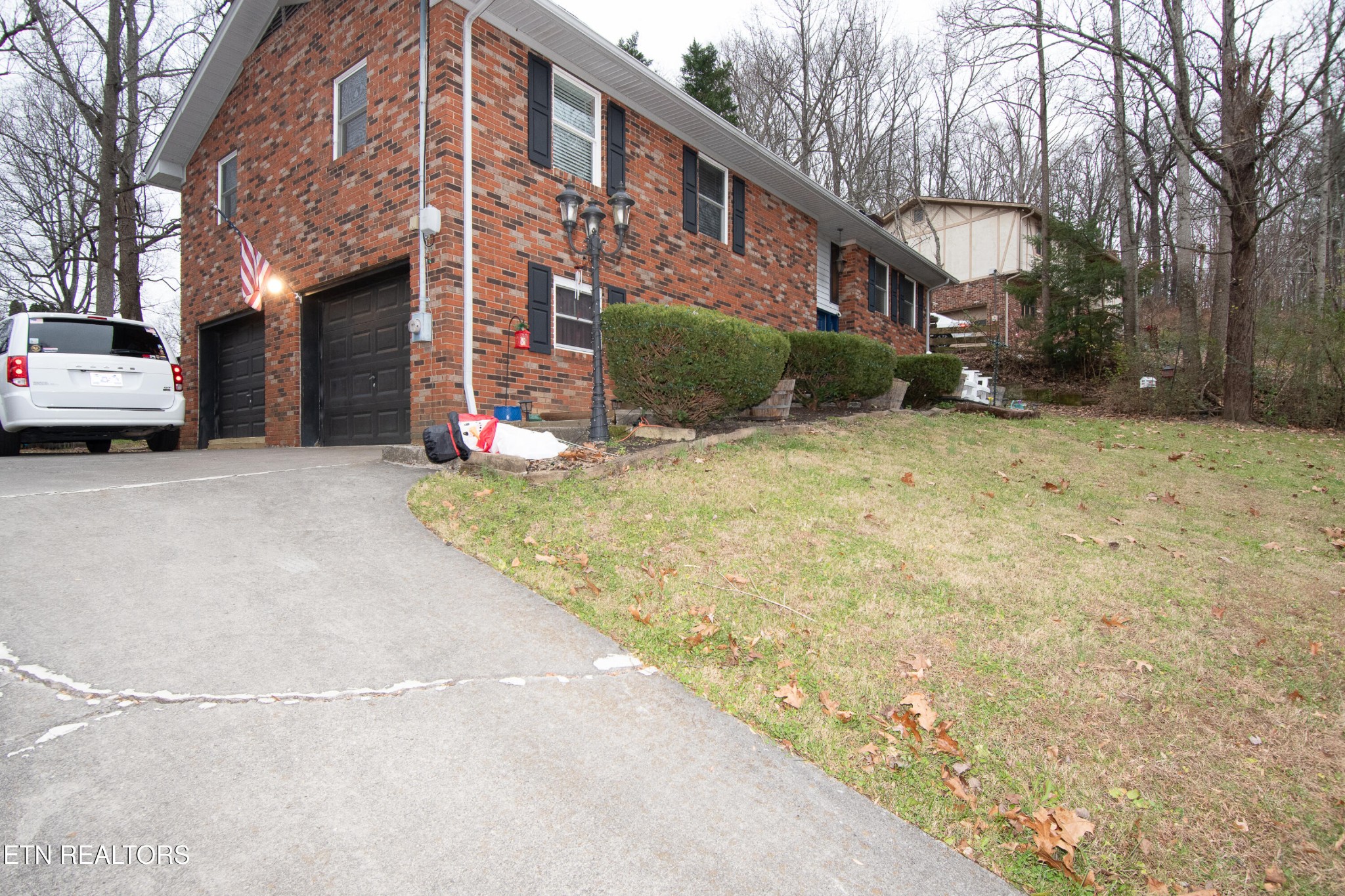 109 Ivy Lane Clinton, TN 37716 - Photo 30 of 36 a view of a house with a yard