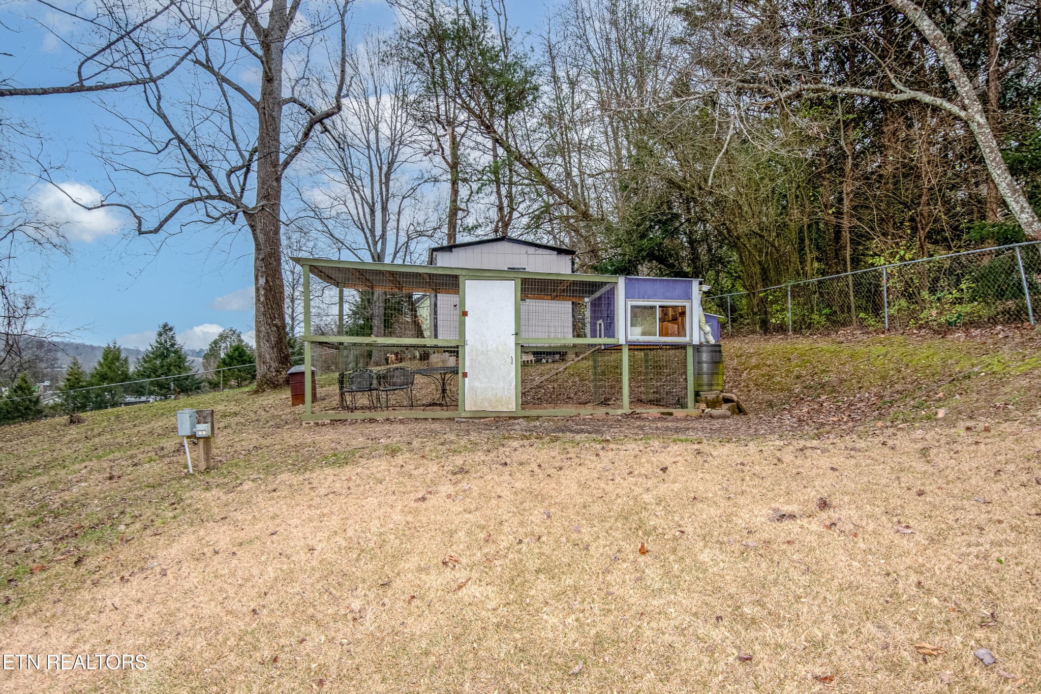 109 Ivy Lane Clinton, TN 37716 - Photo 31 of 36 a house view with a backyard space