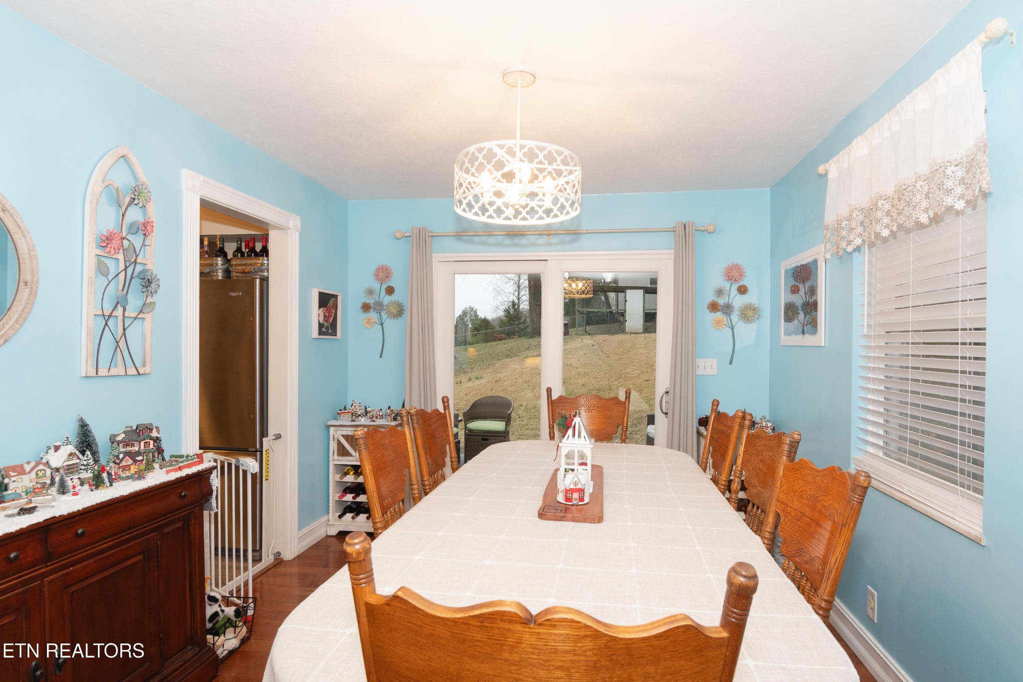 109 Ivy Lane Clinton, TN 37716 - Photo 6 of 36 a view of a dining room with furniture window and outside view