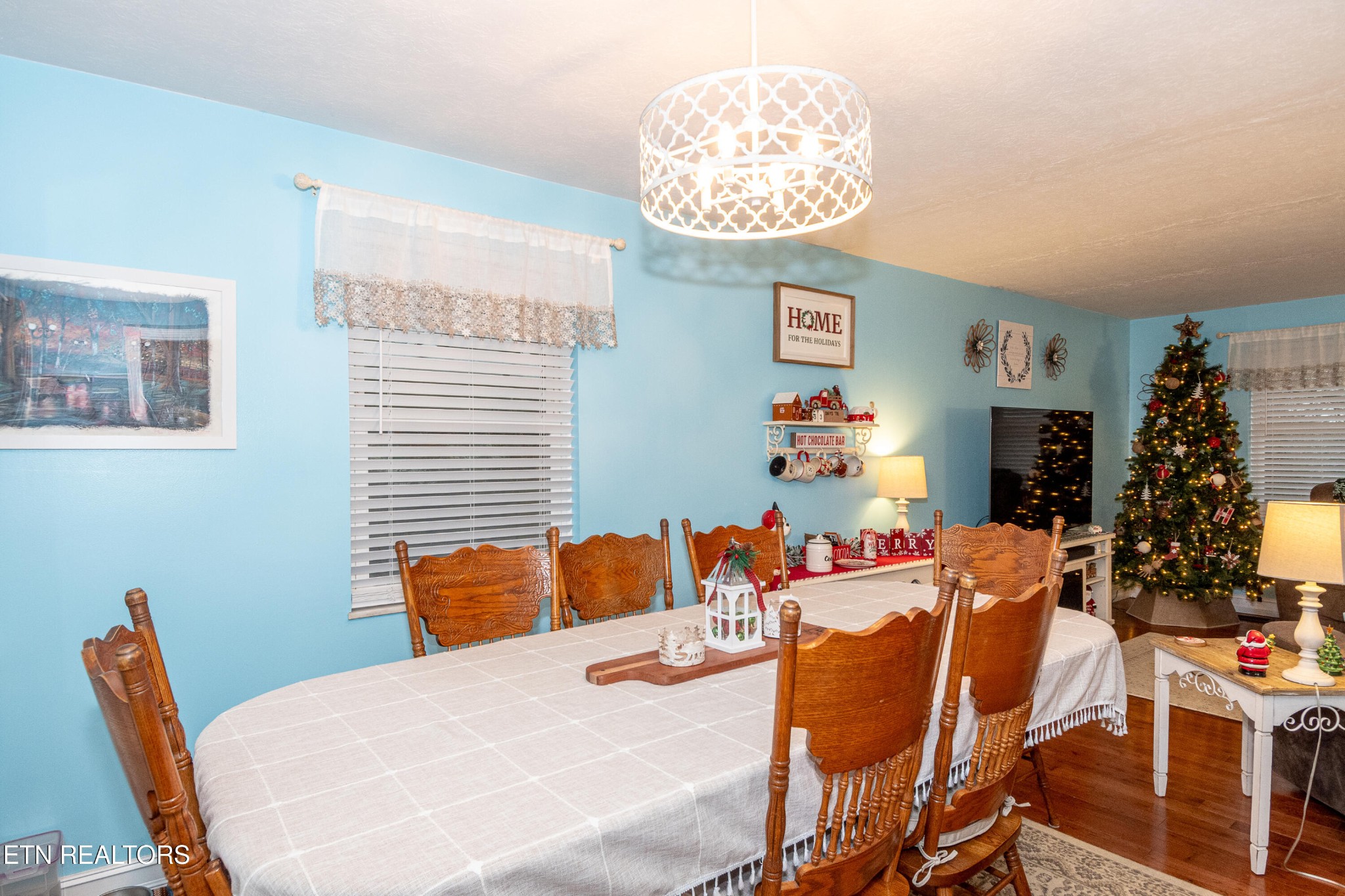 109 Ivy Lane Clinton, TN 37716 - Photo 7 of 36 a bedroom with furniture and a chandelier