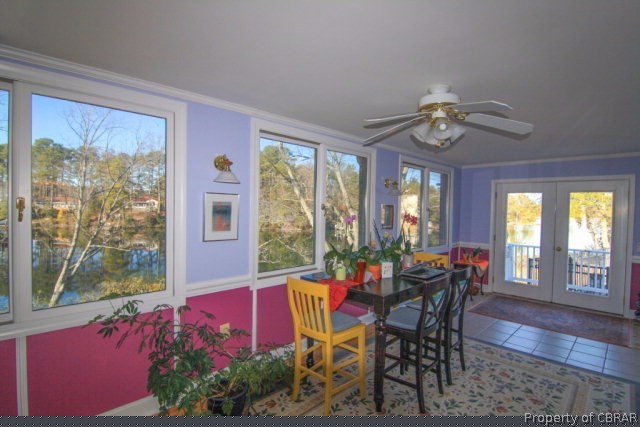 271 Burnt Wharf Road Lancaster, VA 22503 - Photo 15 of 35 a view of a dining room with furniture and window