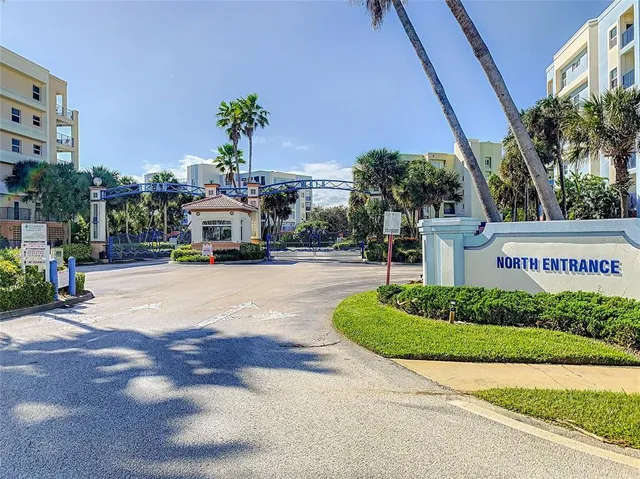 an aerial view of a house with yard