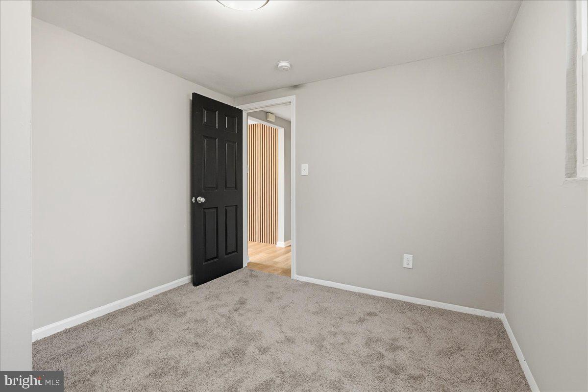 8710 Sum Place Charlotte Hall, MD 20622 - Photo 17 of 30 an empty room with an entryway