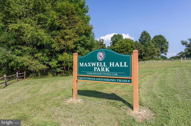 8710 Sum Place Charlotte Hall, MD 20622 - Photo 29 of 30 a sign on the side of the road