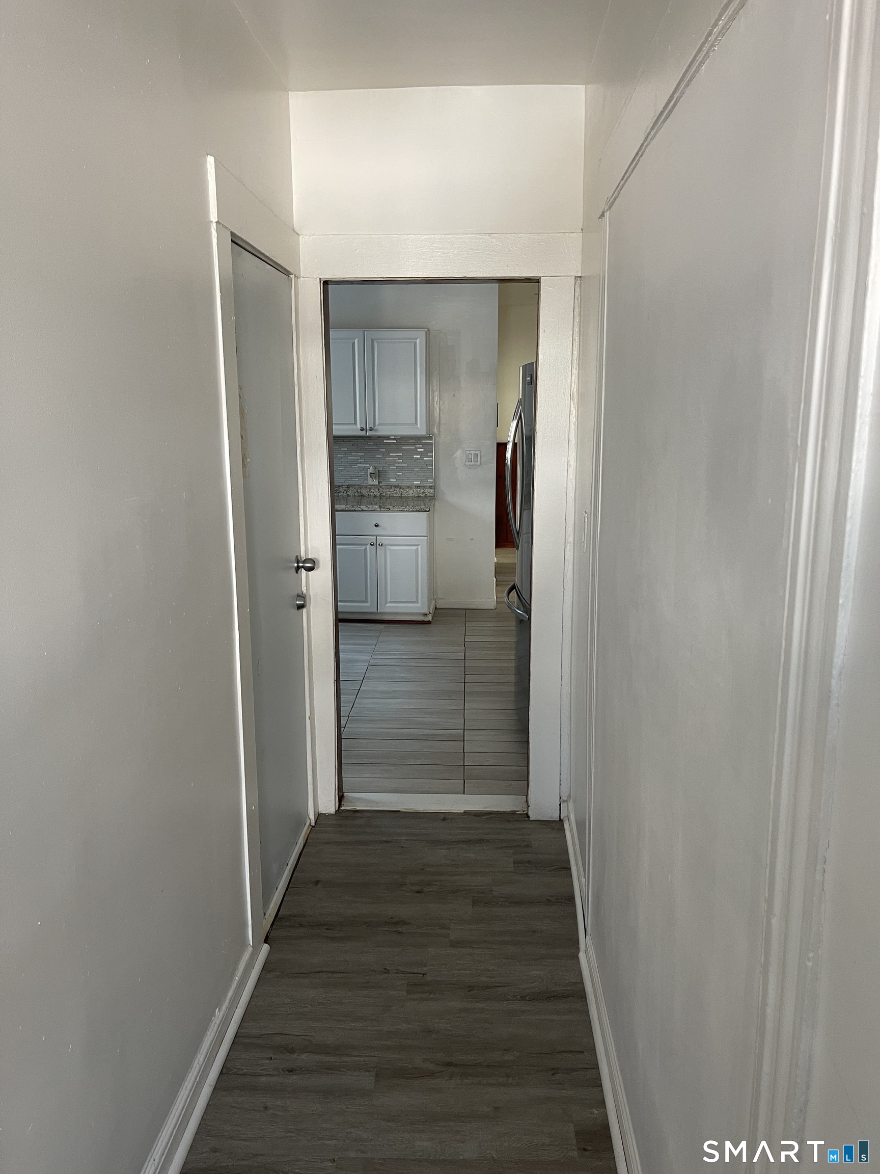 a bathroom with a shower and a sink