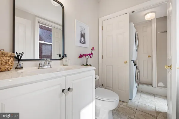a view of a storage and utility room with a window