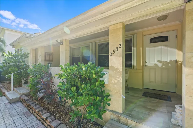 a view of a glass door of the house