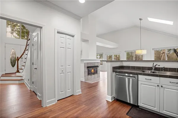 a kitchen with a sink and cabinets