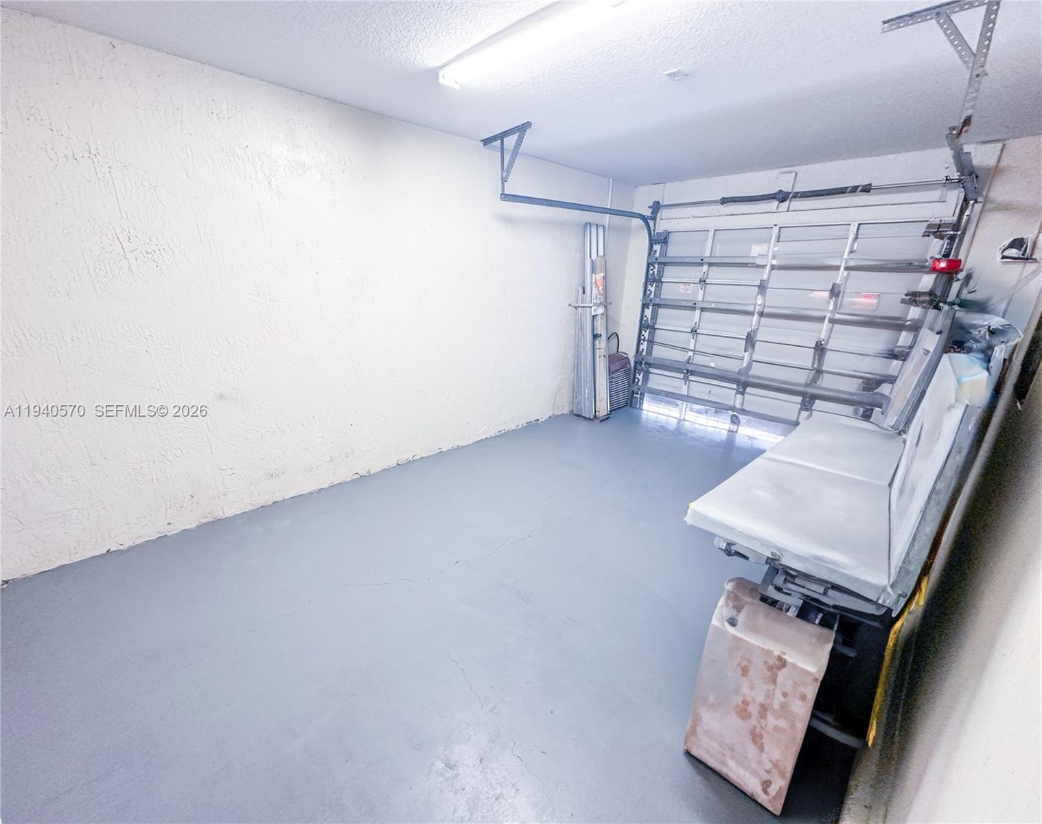 14116 Southwest 260th Street, Unit 105 Homestead, FL 33032 - Photo 21 of 30 a view of storage and utility room