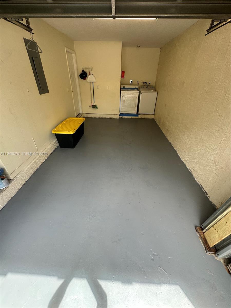 14116 Southwest 260th Street, Unit 105 Homestead, FL 33032 - Photo 22 of 30 a view of a room with rack on the wall