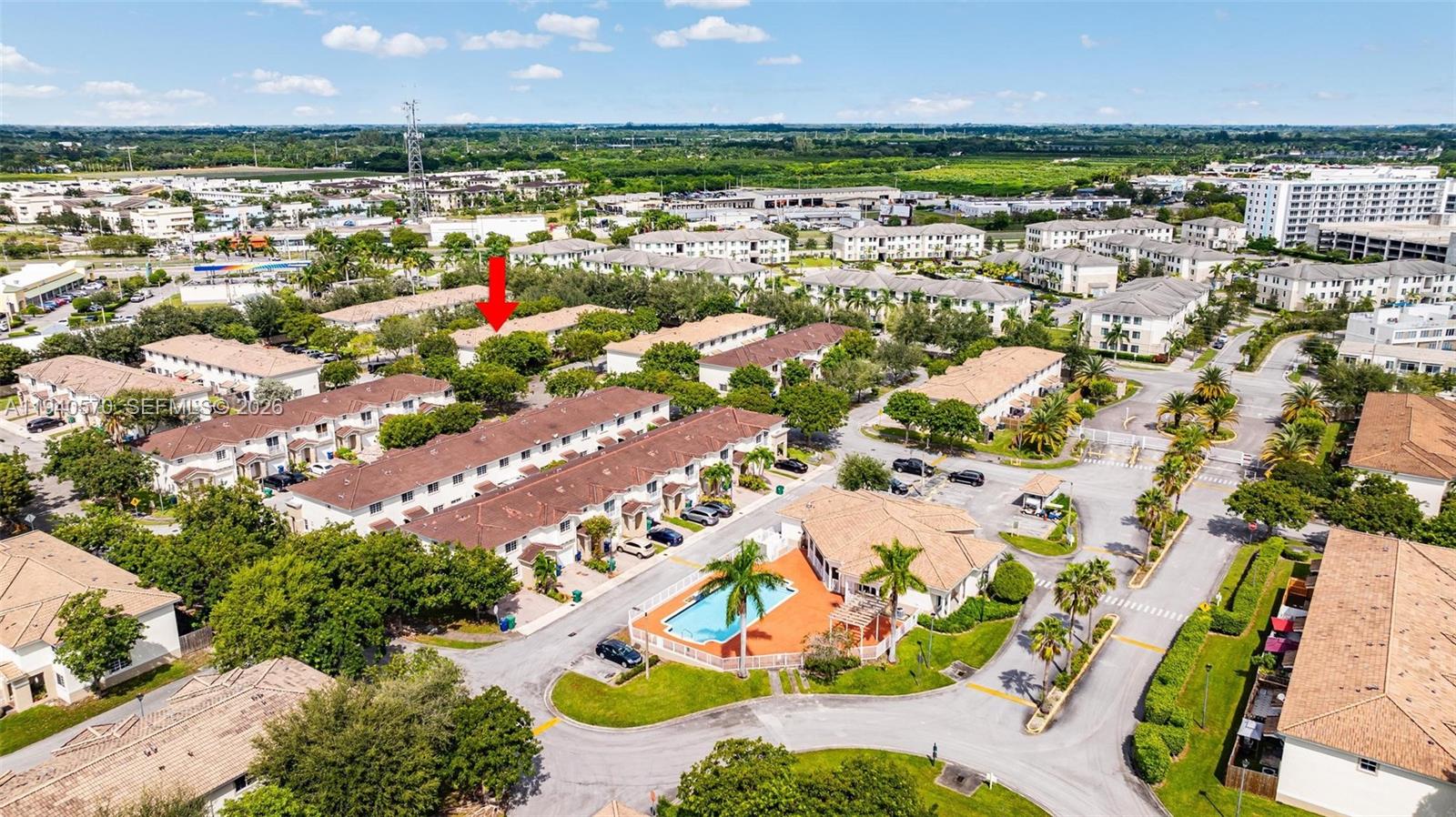 14116 Southwest 260th Street, Unit 105 Homestead, FL 33032 - Photo 24 of 30 an aerial view of a city