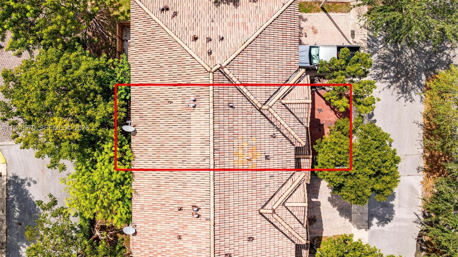 14116 Southwest 260th Street, Unit 105 Homestead, FL 33032 - Photo 26 of 30 a view of entryway with flower plants