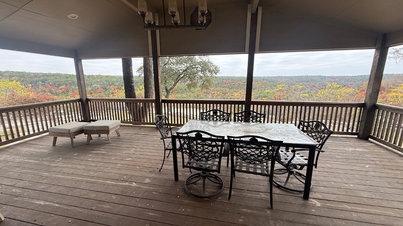 12987 Farm To Market Road 2769 Austin, TX 78726 - Photo 17 of 24 Wooden deck with outdoor dining space