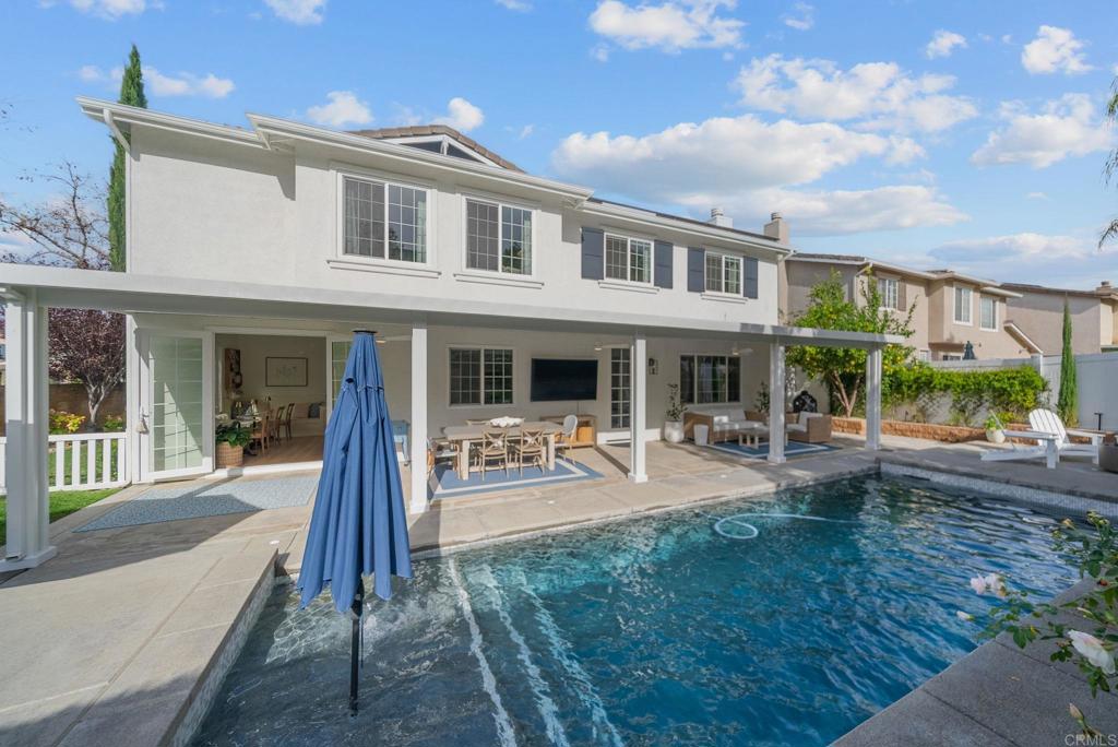 31401 Chemin Chevalier Temecula, CA 92591 - Photo 2 of 74 a front view of house with yard outdoor seating and barbeque oven