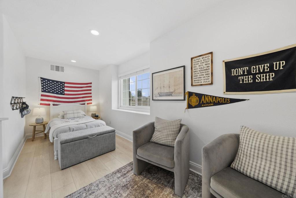31401 Chemin Chevalier Temecula, CA 92591 - Photo 23 of 74 a bedroom with furniture and a painting on the wall