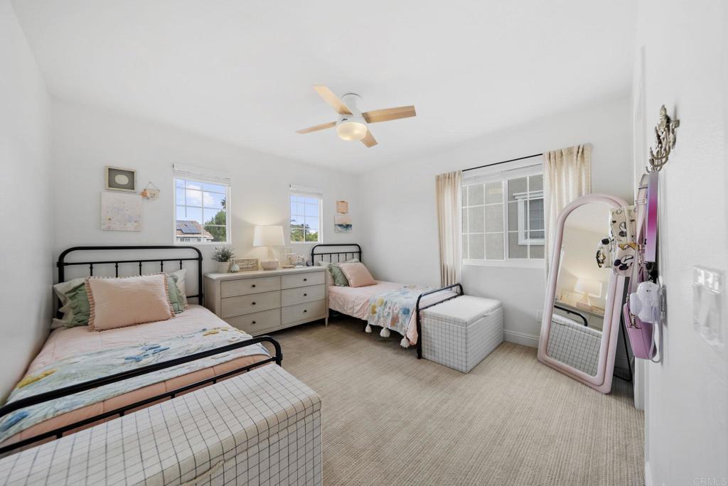 31401 Chemin Chevalier Temecula, CA 92591 - Photo 26 of 74 a bedroom with bed and a chandelier