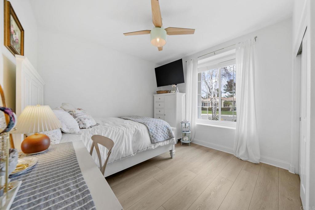 31401 Chemin Chevalier Temecula, CA 92591 - Photo 33 of 74 a bedroom with a bed and flat screen tv