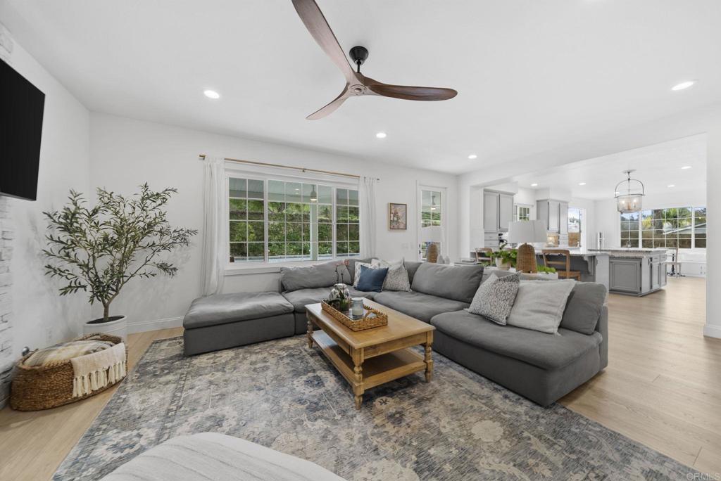 31401 Chemin Chevalier Temecula, CA 92591 - Photo 40 of 74 a living room with furniture and a flat screen tv