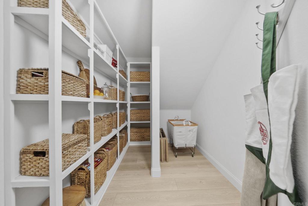 31401 Chemin Chevalier Temecula, CA 92591 - Photo 42 of 74 a view of walk in closet with clothes and shoes