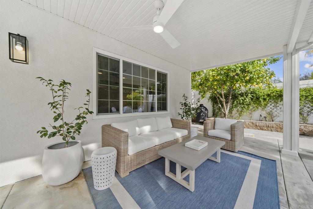 31401 Chemin Chevalier Temecula, CA 92591 - Photo 43 of 74 a living room with furniture potted plant and a large window