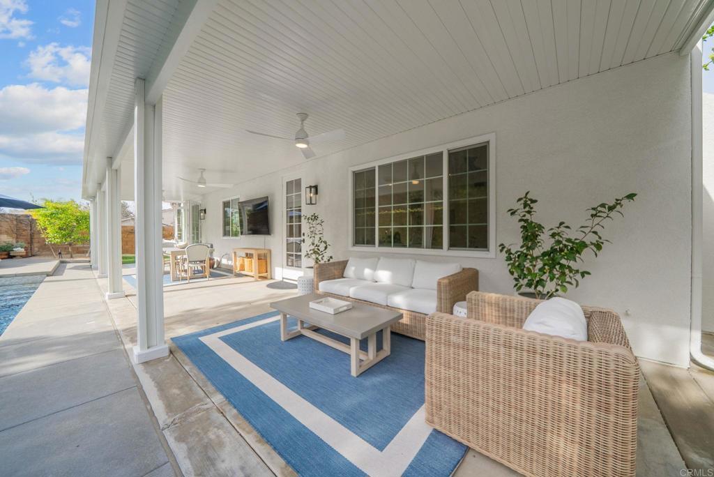 31401 Chemin Chevalier Temecula, CA 92591 - Photo 45 of 74 a living room with furniture and a potted plant