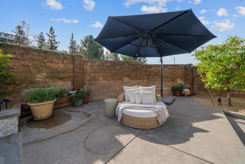 31401 Chemin Chevalier Temecula, CA 92591 - Photo 50 of 74 a view of a patio with couches and potted plants