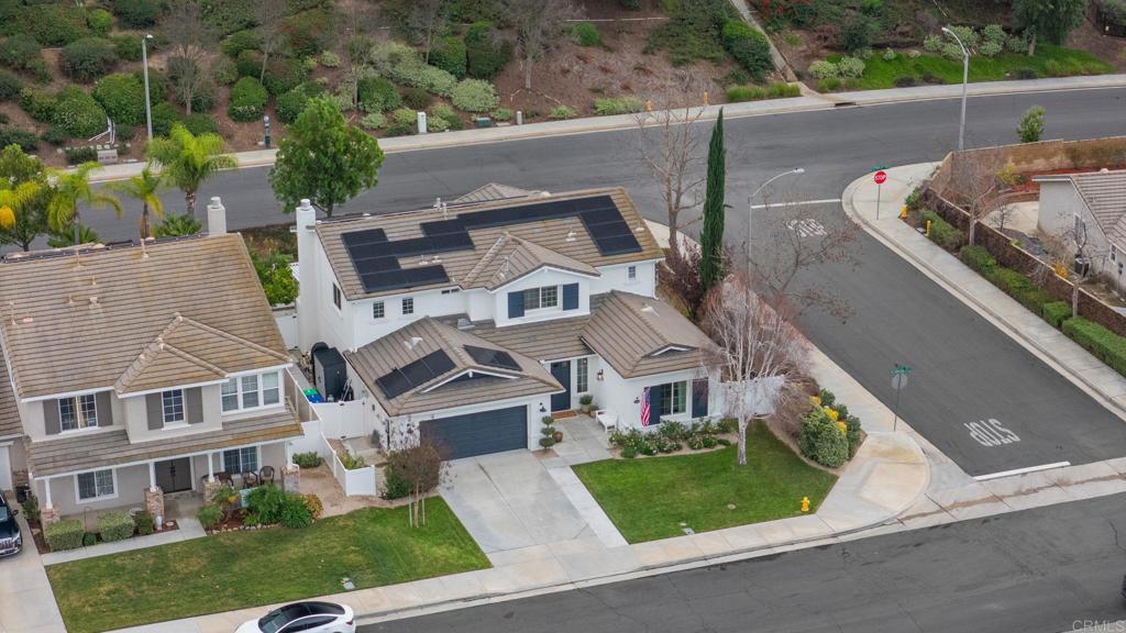 31401 Chemin Chevalier Temecula, CA 92591 - Photo 52 of 74 a aerial view of a house with garden