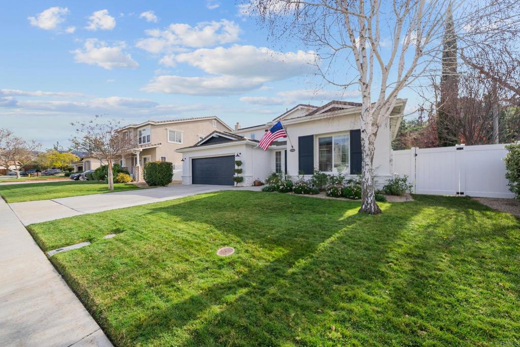 31401 Chemin Chevalier Temecula, CA 92591 - Photo 66 of 74 a front view of house with yard and green space