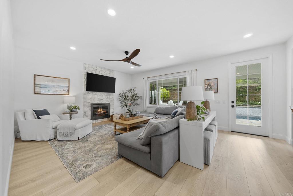31401 Chemin Chevalier Temecula, CA 92591 - Photo 9 of 74 a living room with furniture and a flat screen tv