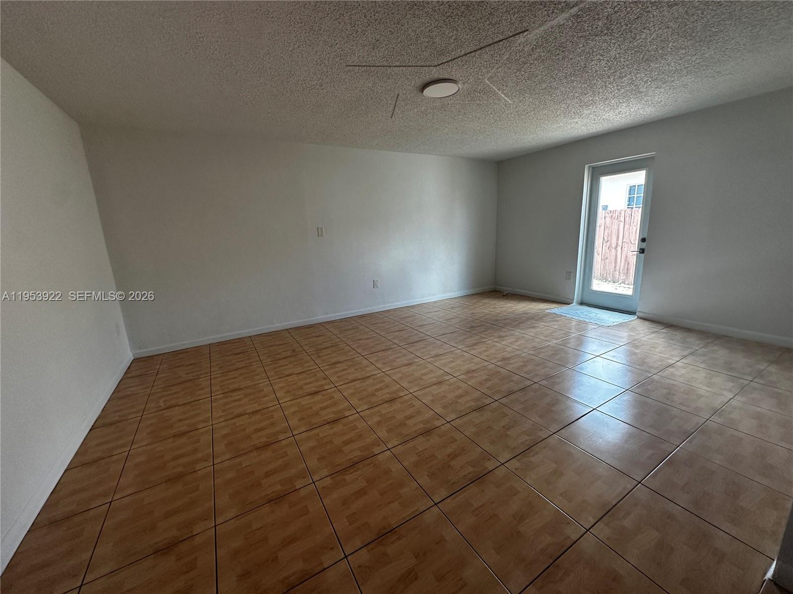 350 West 34th Street Hialeah, FL 33012 - Photo 3 of 22 a view of an empty room and window