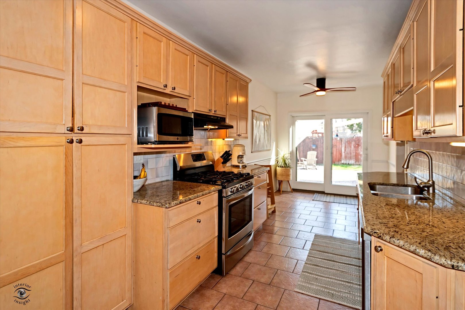 10025 South Hamilton Avenue Chicago, IL 60643 - Photo 19 of 51 a kitchen with stainless steel appliances granite countertop a stove sink and cabinets