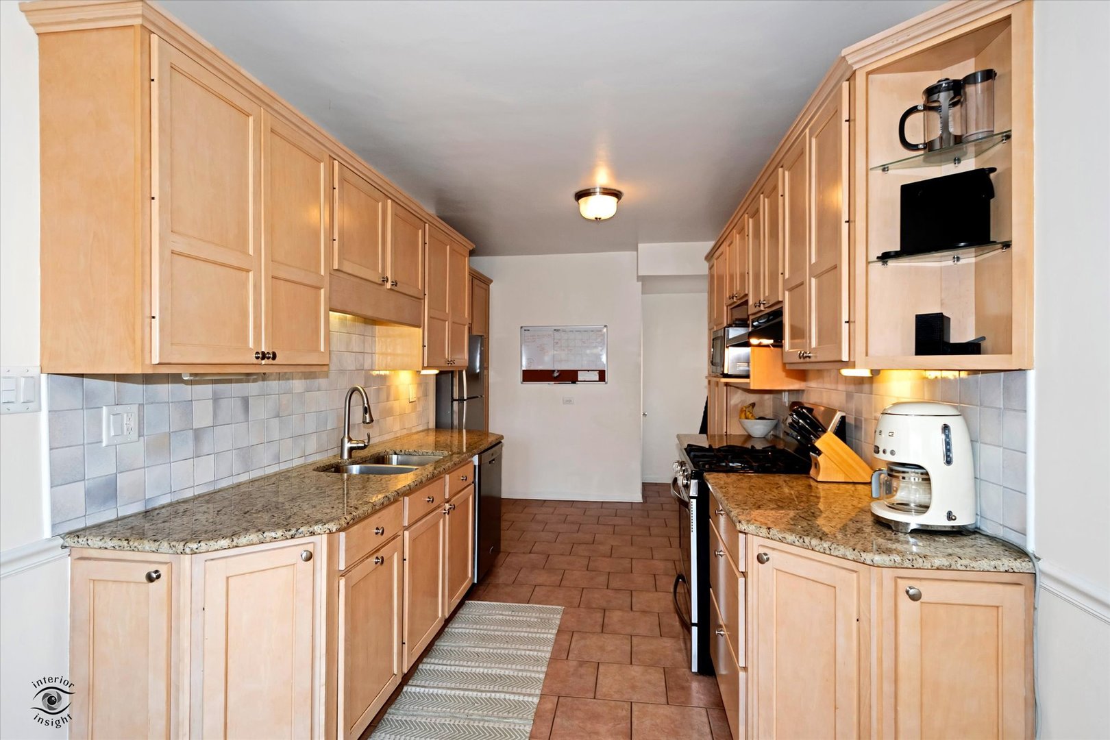 10025 South Hamilton Avenue Chicago, IL 60643 - Photo 21 of 51 a kitchen with stainless steel appliances granite countertop a stove and a sink