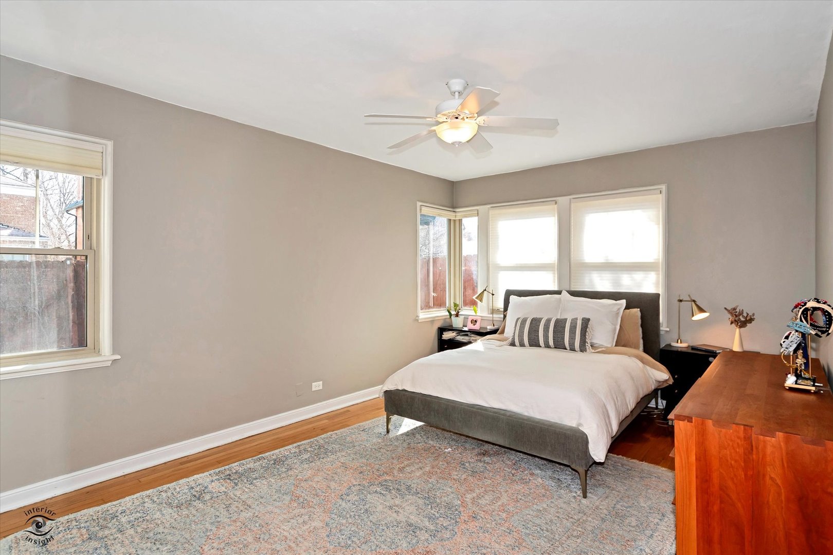 10025 South Hamilton Avenue Chicago, IL 60643 - Photo 25 of 51 a bedroom with a bed and a chandelier