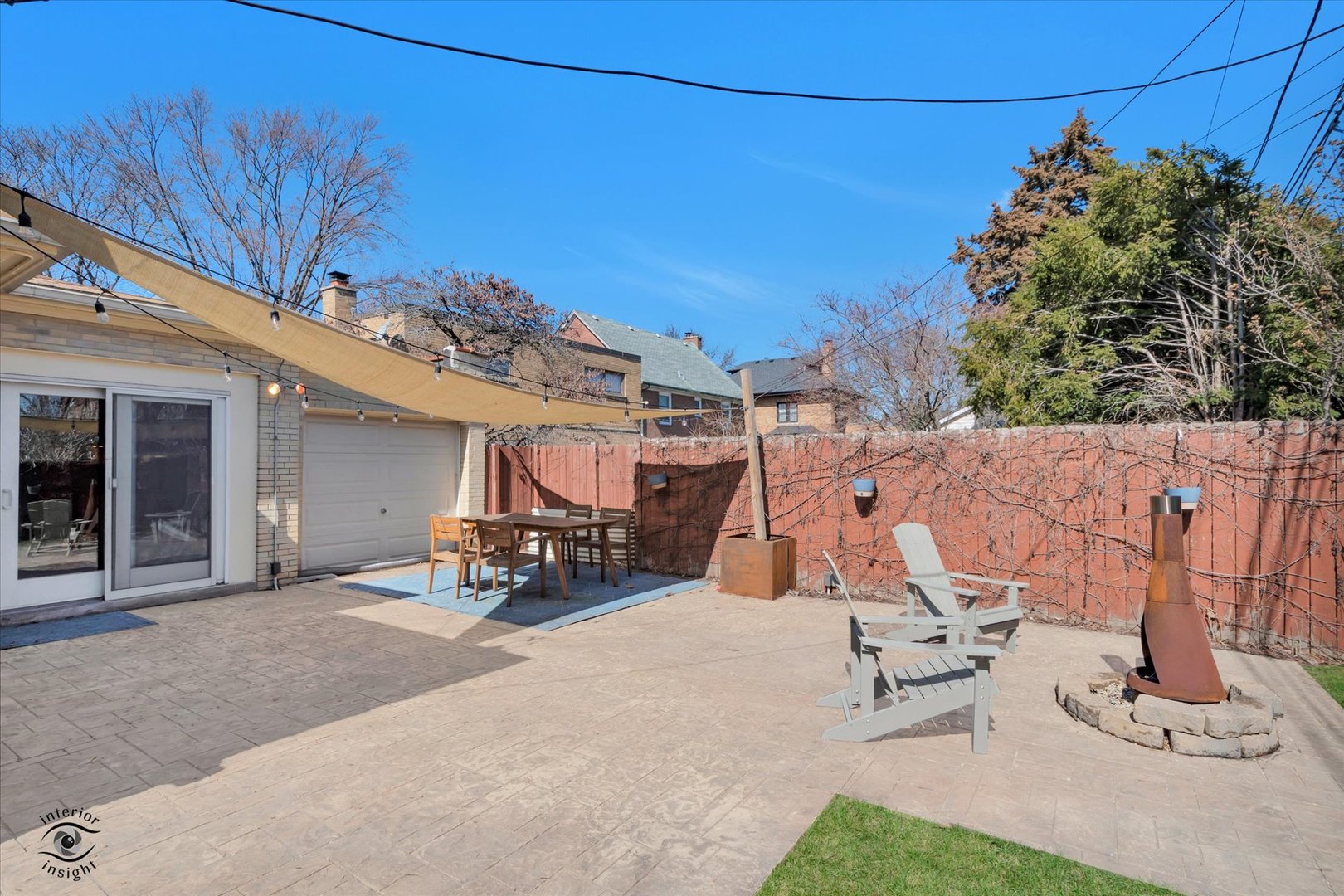 10025 South Hamilton Avenue Chicago, IL 60643 - Photo 45 of 51 a view of a patio with a table and chairs