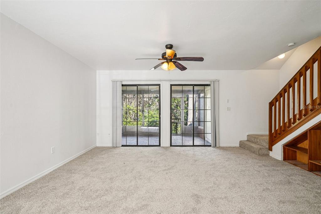 5606 Southwest 8th Place Gainesville, FL 32607 - Photo 11 of 28 a view of an empty room with a window