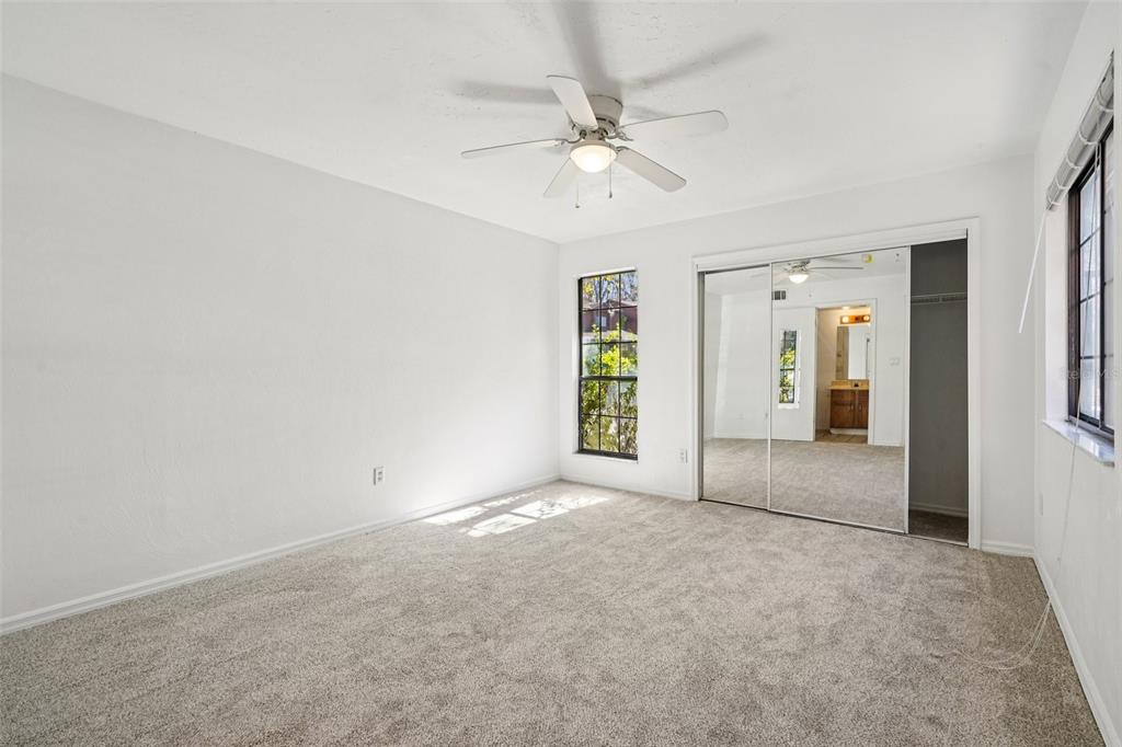 5606 Southwest 8th Place Gainesville, FL 32607 - Photo 14 of 28 a view of a livingroom with a ceiling fan and window