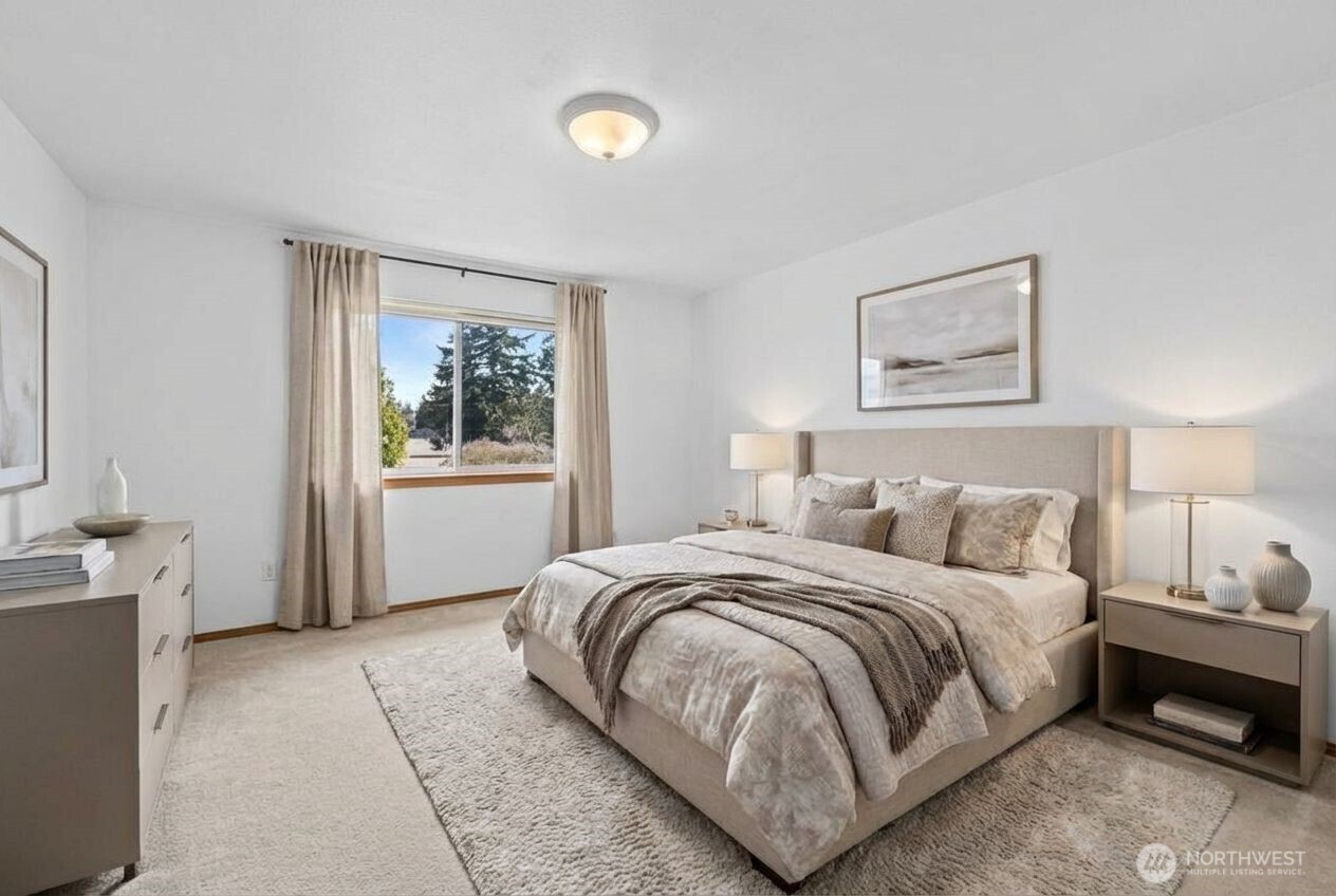 1496 Aberdeen Avenue Northeast Renton, WA 98056 - Photo 16 of 28 a bedroom with a bed and a painting on the wall