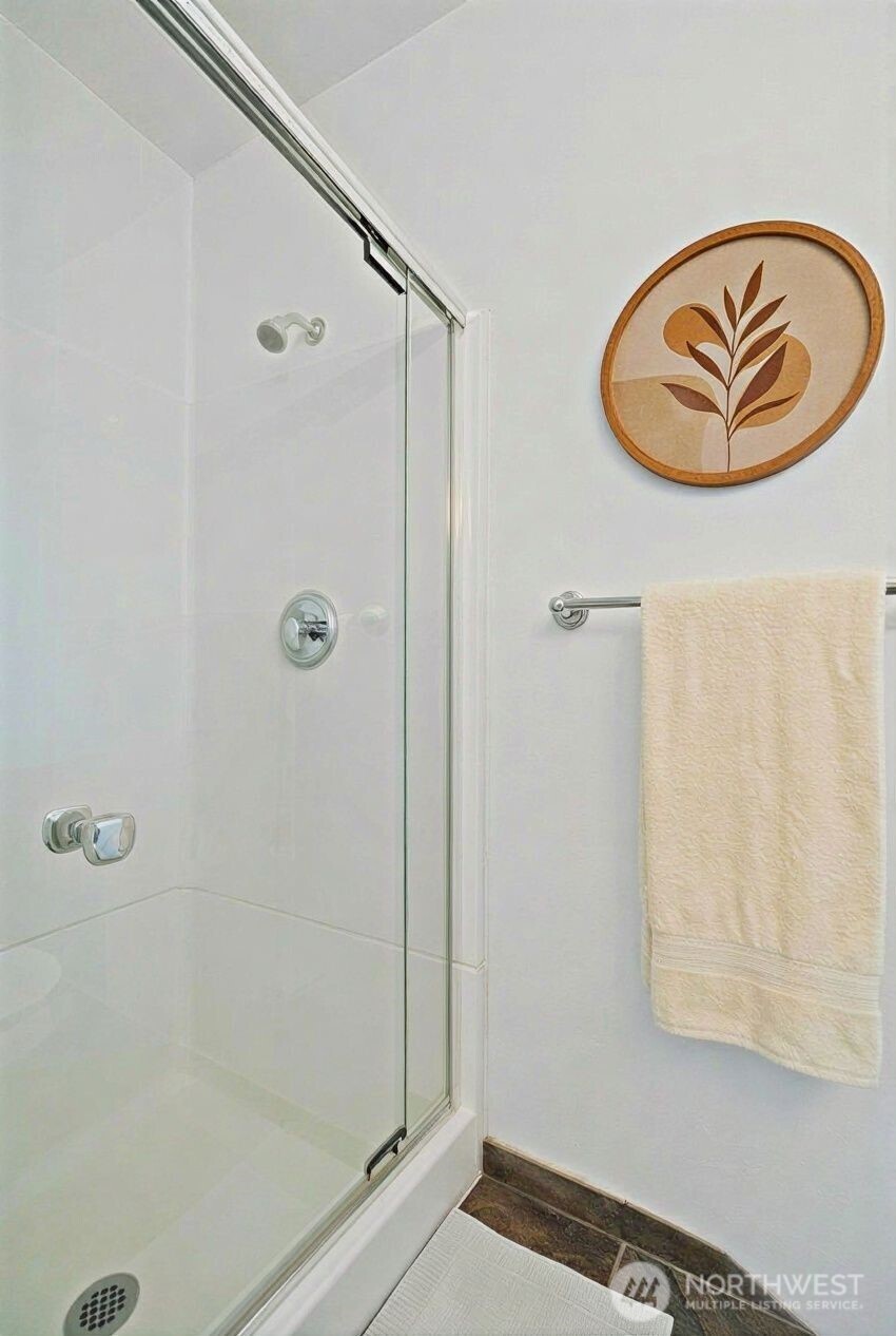 1496 Aberdeen Avenue Northeast Renton, WA 98056 - Photo 20 of 28 a bathroom with a bathtub and shower