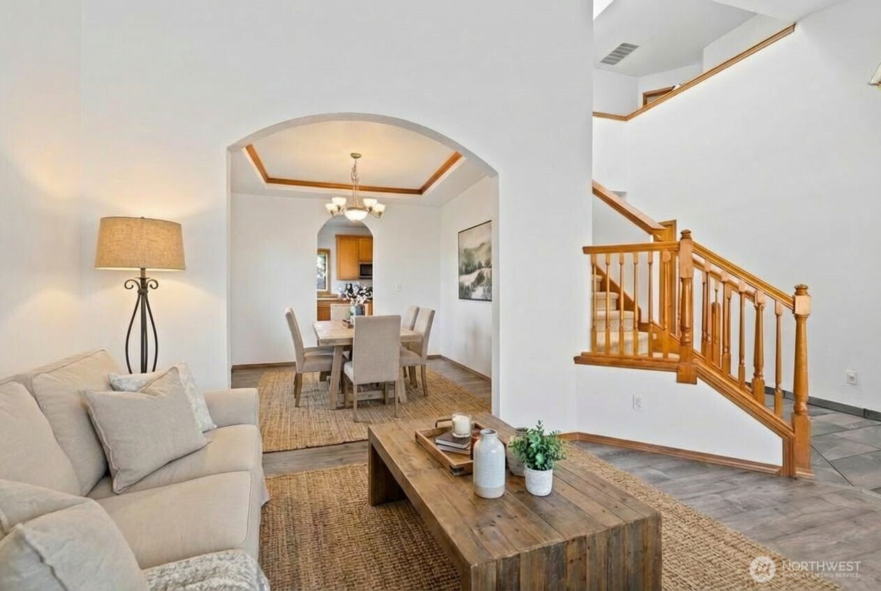 1496 Aberdeen Avenue Northeast Renton, WA 98056 - Photo 5 of 28 a living room with furniture and a table