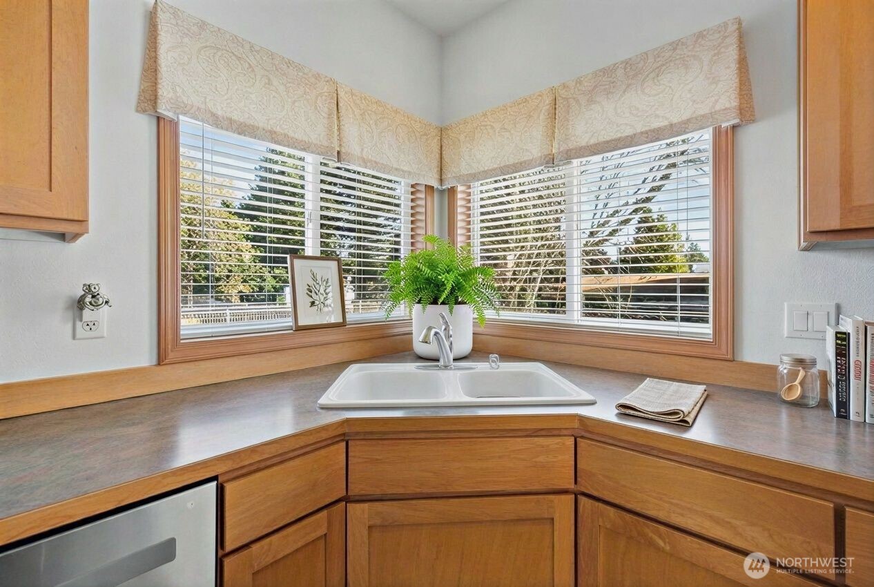 1496 Aberdeen Avenue Northeast Renton, WA 98056 - Photo 9 of 28 a kitchen with sink and large window