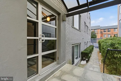 a view of a building with a street
