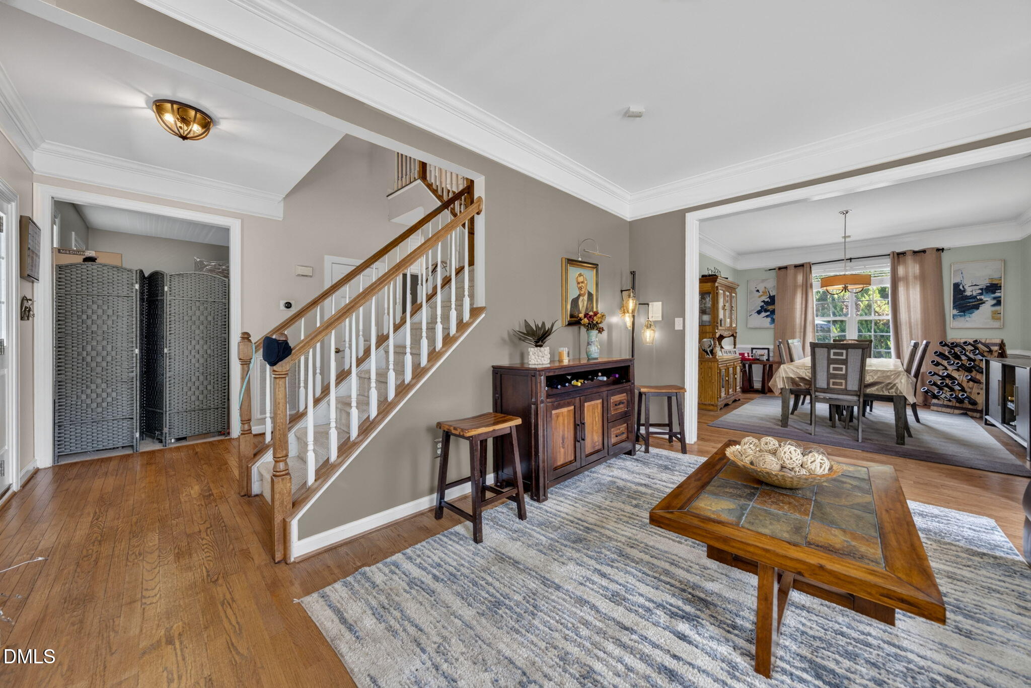 1258 Horsham Way Apex, NC 27502 - Photo 7 of 32 a living room with furniture and a table