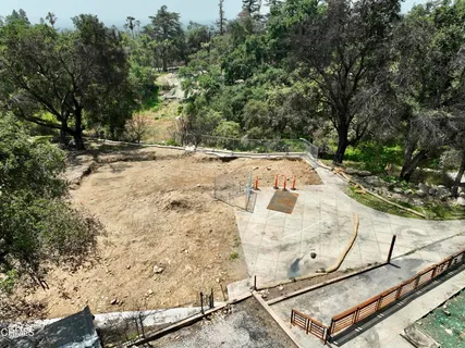 a view of a backyard with wooden floor