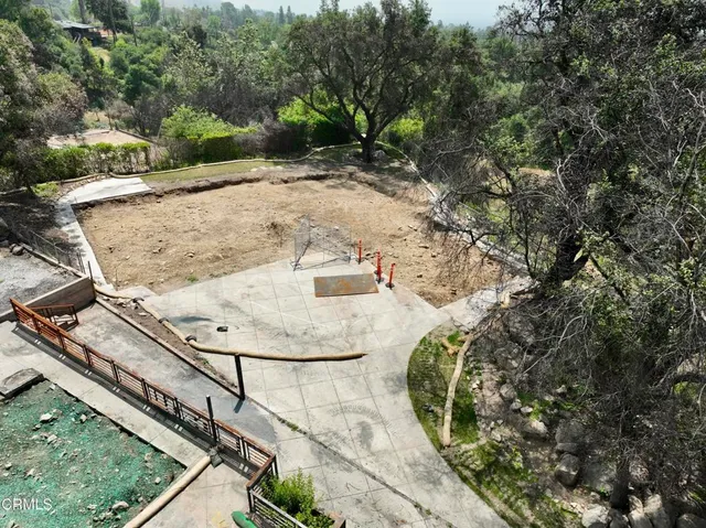 a view of a backyard of a house