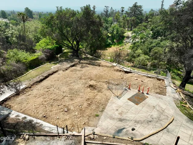 a view of a backyard of a house