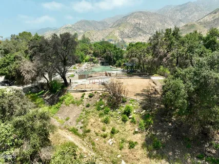 a view of a town with mountains in the background