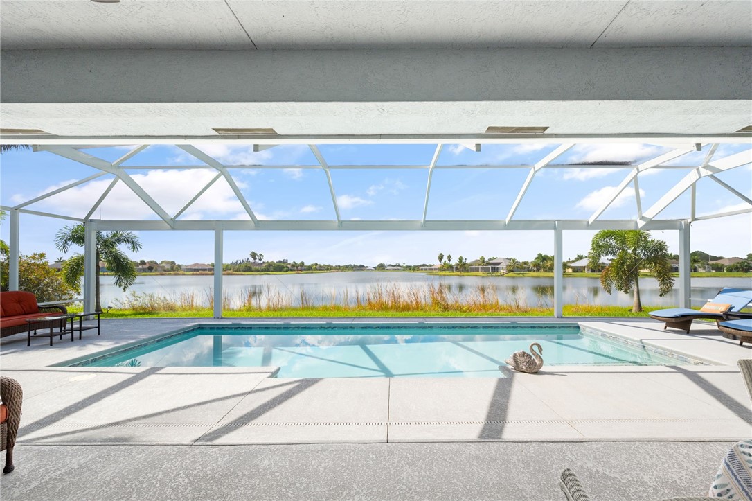 933 Yearling Trail Sebastian, FL 32958 - Photo 1 of 36 a view of swimming pool from a balcony